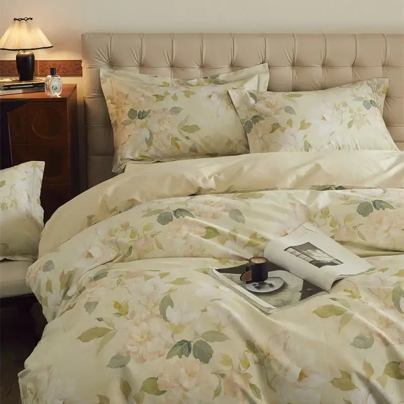 Cream-colored bedding set with decorbites butterfly blooming flowers in beige blush on satin-like cotton fabric