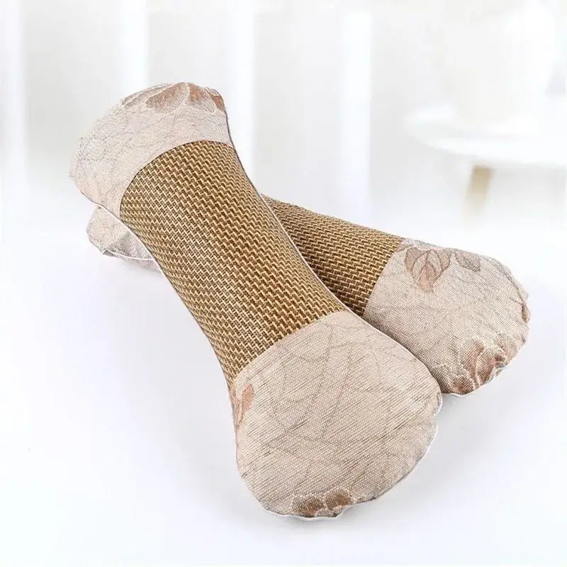 Beige and tan woven fabric socks with lace trim shown alongside beige and brown floral decorbites cooling neck pillow