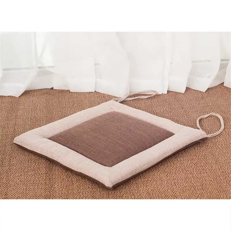 Beige and brown linen seat cushion with non-slip backing and fabric loops for hanging dining room chair decorbites linen seat