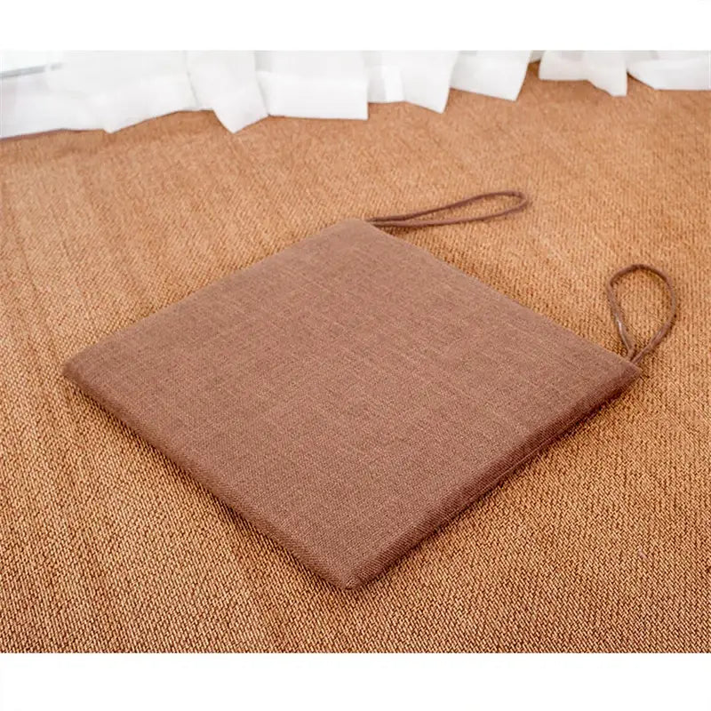 Beige and brown linen seat cushion with textured fabric and woven handles non slip decorbites linen seat pad