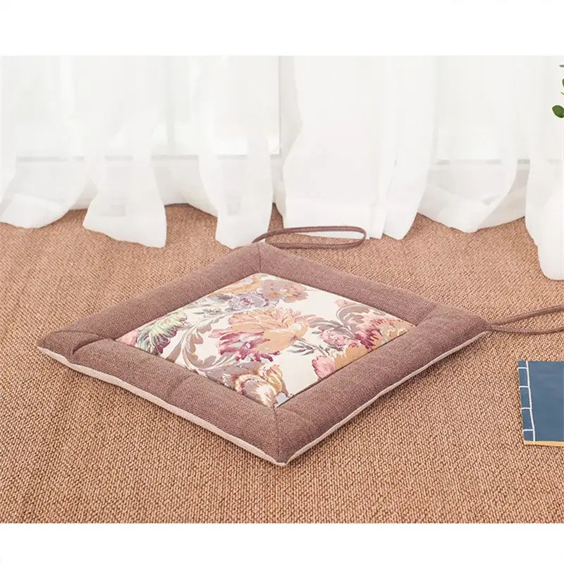 Beige and brown non-slip decorbites linen seat cushion with floral center and fabric loops for dining room chair pad