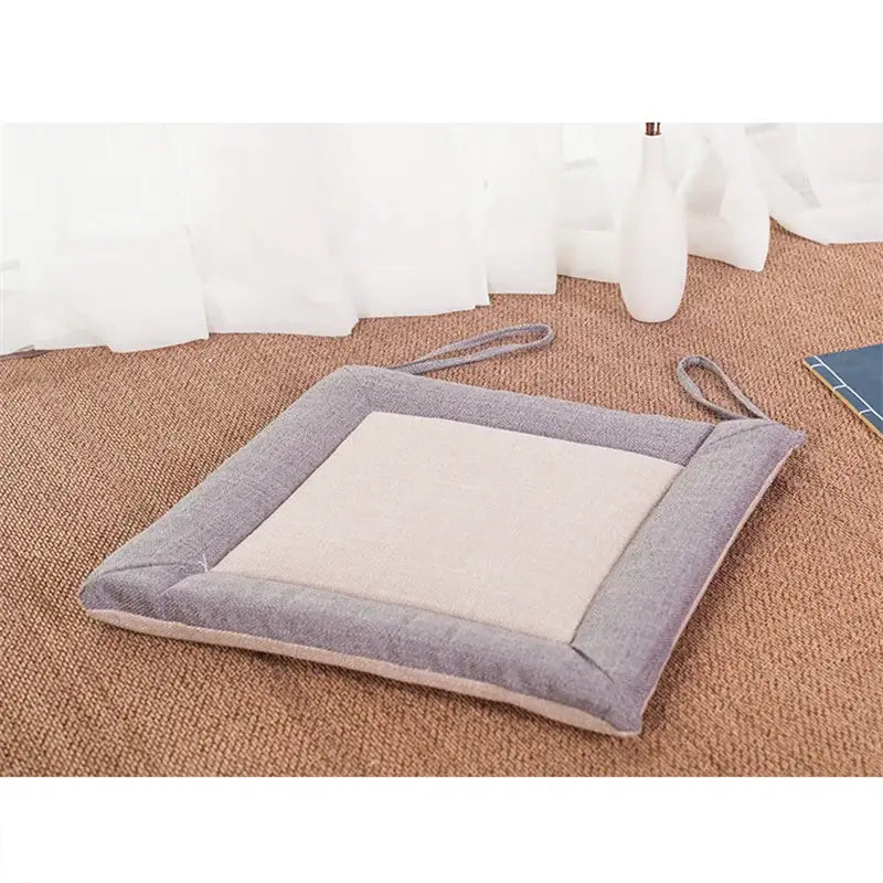 Beige and brown non-slip linen seat cushion with gray and beige fabric ties for dining room chairs from decorbites linen seat