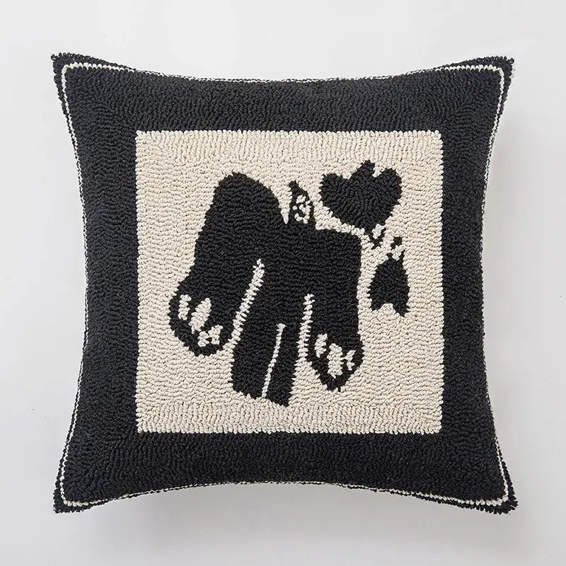 Black and cream hooked rug cushion cover with stylized poodle design for decorbites geometric line art decor