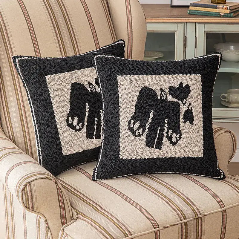 Black and cream hooked rug cushion cover with stylized elephant design for decorbites geometric line art living room decor