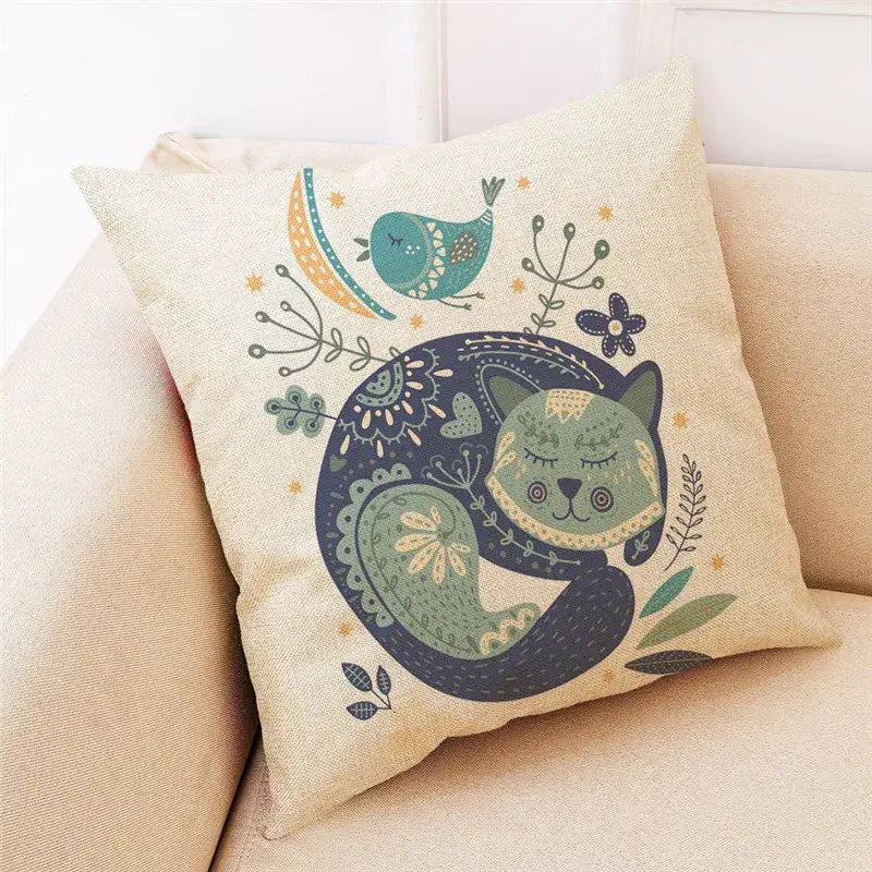 Beige cartoon cat linen throw pillow with whimsical sleeping green cat, teal bird, and stylized foliage decorbites cartoon cat design