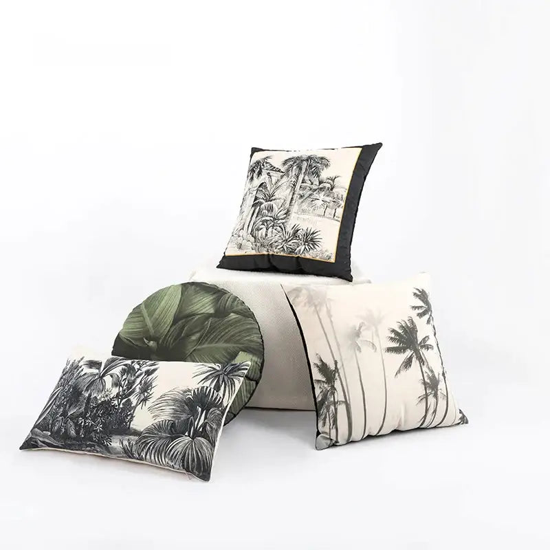 Beige cartoon print velvet cushion cover featuring black and white tropical palm and bold green leaf decorbites jungle cartoon design