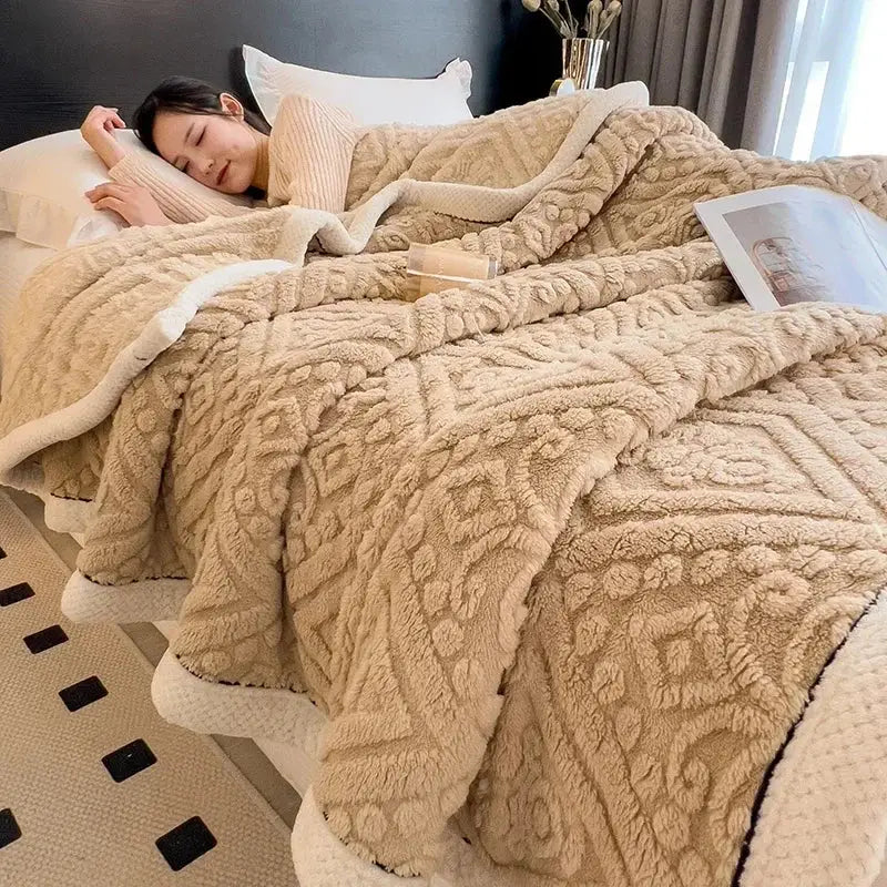 Beige carved velvet warmth blanket with textured geometric pattern and soft white inner lining for plush decorbites throw