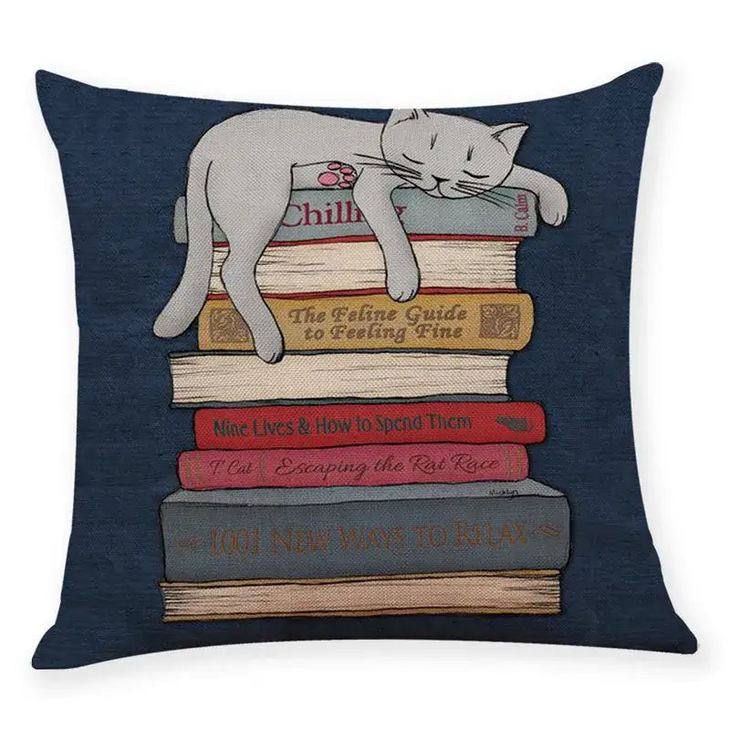 Navy blue cushion cover featuring a decorbites creative cat lounging on illustrated books pillow case 45x45cm