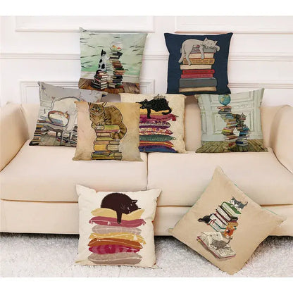 Beige cushion cover with black cat lounging on colorful stacked books pillow case 45x45cm decorbites creative cat
