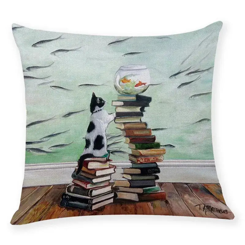 Beige cushion cover featuring a painted black and white cat reaching for fishbowl on books pillow case 45x45cm decorbites creative cat