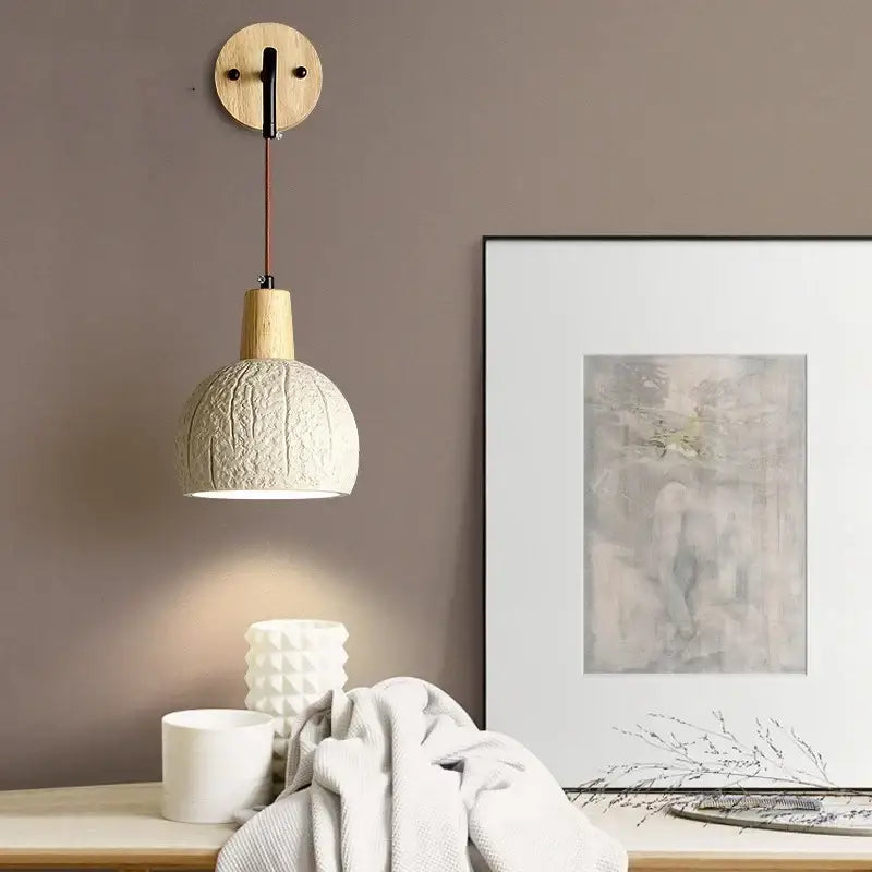 Beige decorbites cement shade wood wall sconce with white textured ceramic pendant lamp and circular mount for bedroom decor