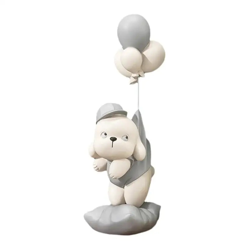 Beige ceramic balloon puppy statue featuring a cute white and gray resin puppy figurine holding balloons for living room decor