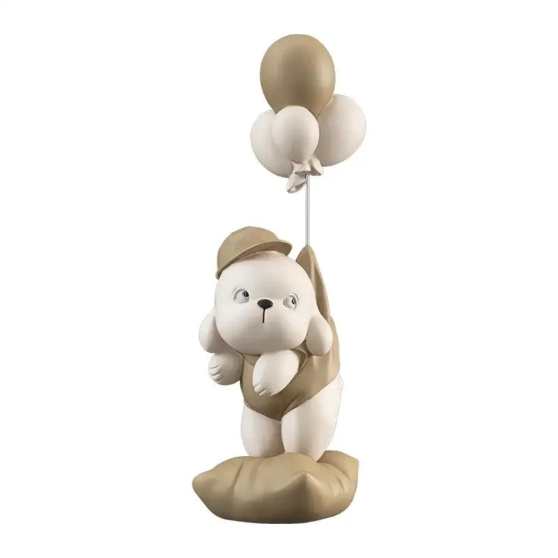 Beige ceramic balloon puppy statue featuring a cute resin beige and white puppy holding three balloons for living room decor