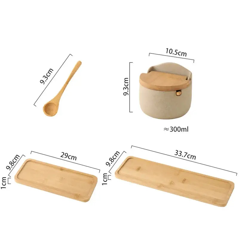 Beige ceramic seasoning jar set with bamboo lid handle and matching bamboo spoons and trays by decorbites ceramic seasoning