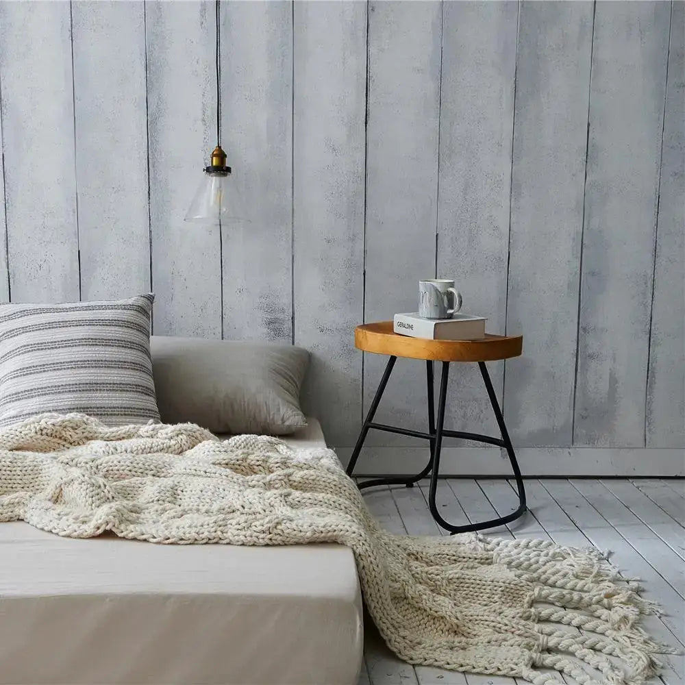 Beige chunky knit tassel throw blanket with cream-colored braided pattern and fringed edges for bedroom decorbites beige chunky use