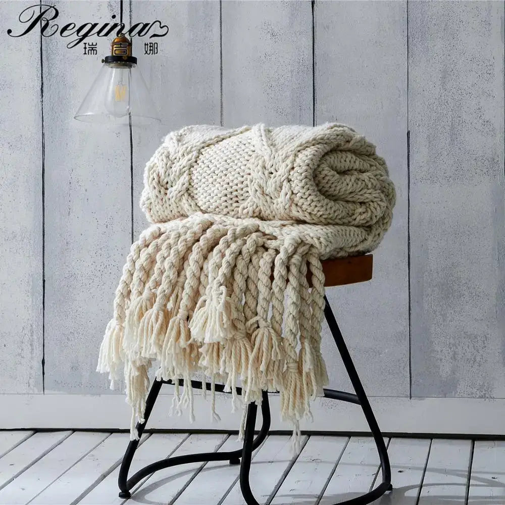 Beige chunky knit tassel blanket with cream-colored braided cable pattern and fringe for soft bedroom decorbites beige chunky throw