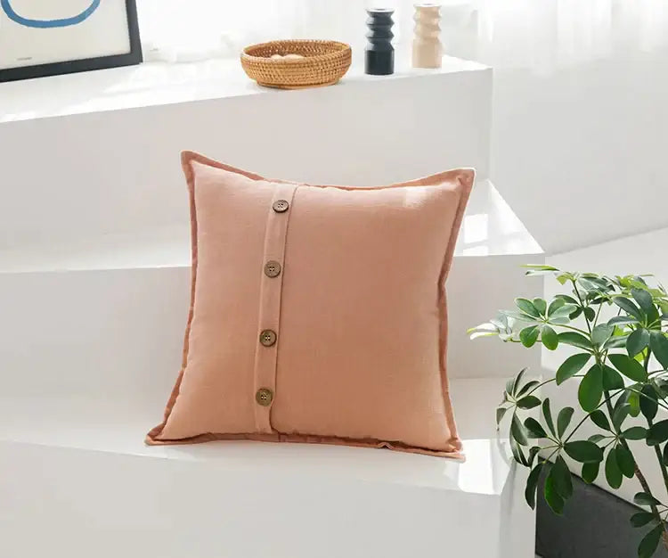 Beige cotton linen cushion cover with soft peach color and five wooden buttons for living room decorbites decor