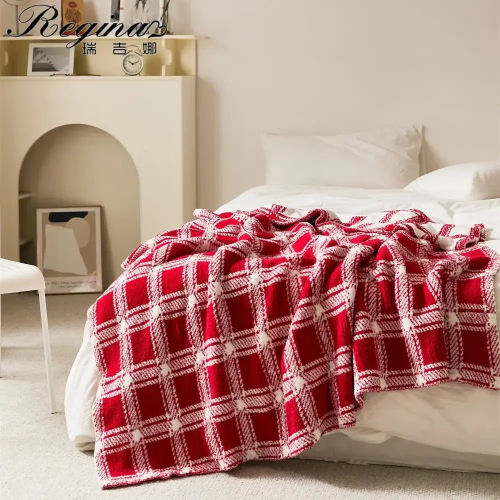 Red and white plaid throw blanket with a soft textured knit pattern from decorbites fluffy stripe plaid collection