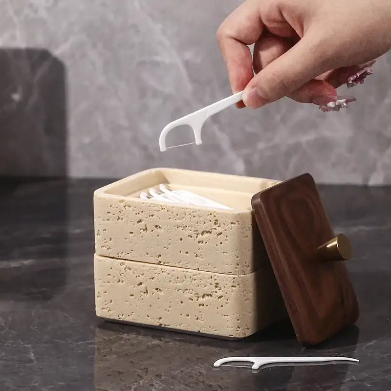 Beige and dark wood double decker natural stone jewelry organizer with textured concrete and gold-tone knob lid