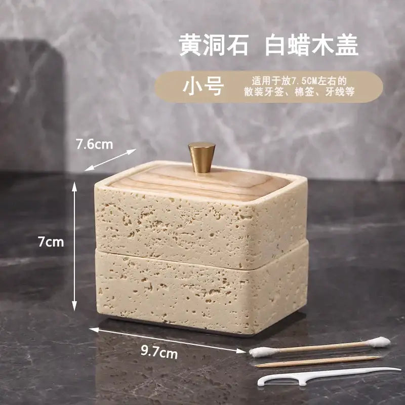 Beige and dark wood double decker natural stone jewelry organizer with textured stone and brass knob for bathroom storage