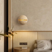 Beige dino egg stone wall lamp with gold accent and horizontal strip for bedroom decorbites wall lamp decor