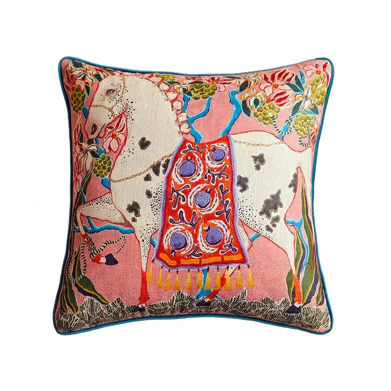 Beige pillow case featuring vibrant bird pattern art with a stylized white horse and ornate saddle for living room sofa