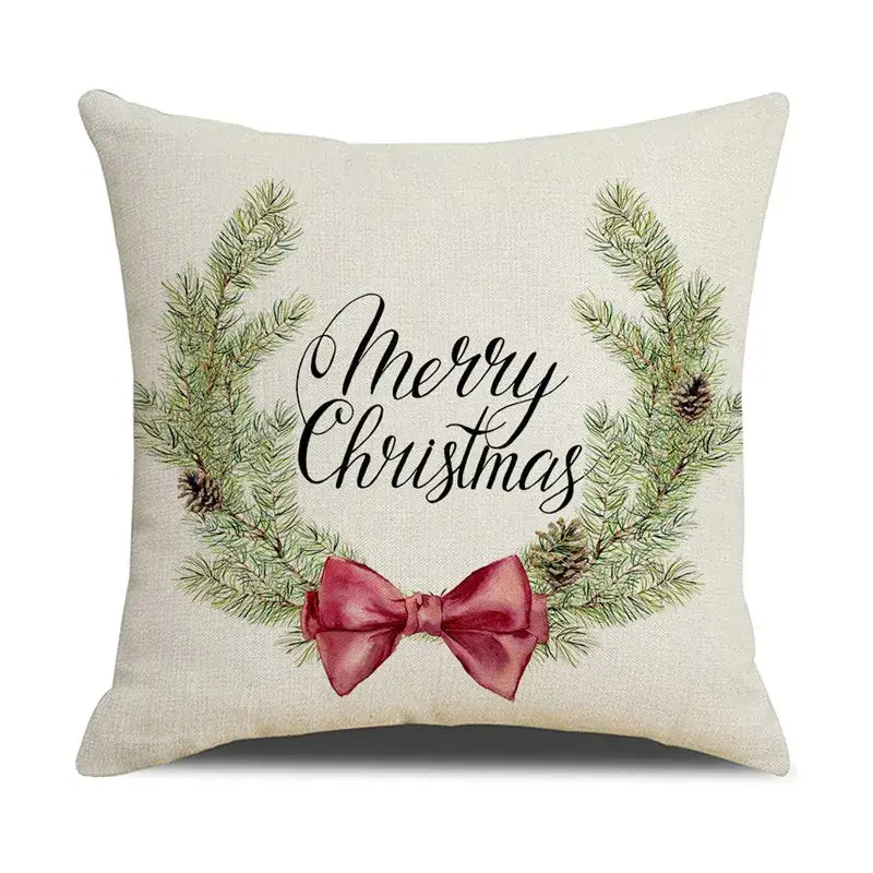 Beige linen throw pillow with merry christmas design featuring green pine branches pinecones and red bow decorbites cartoon birds