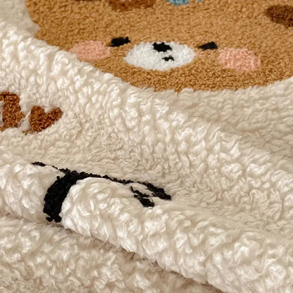 Beige embroidered teddy fleece blanket with cream plush soft texture and cozy teddy fleece bear face decorbites design