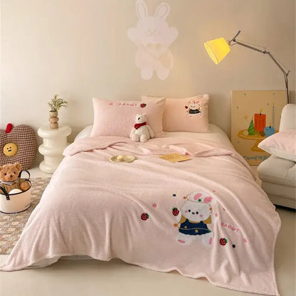Beige embroidered teddy fleece blanket with pink plush fabric featuring a rabbit holding strawberries for cozy teddy fleece decorbites