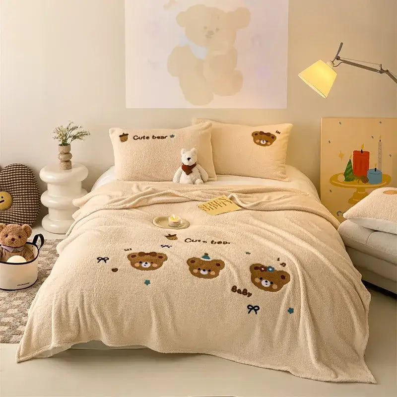 Beige embroidered teddy fleece blanket with cozy teddy fleece material and cute bear face decorbites cozy teddy design