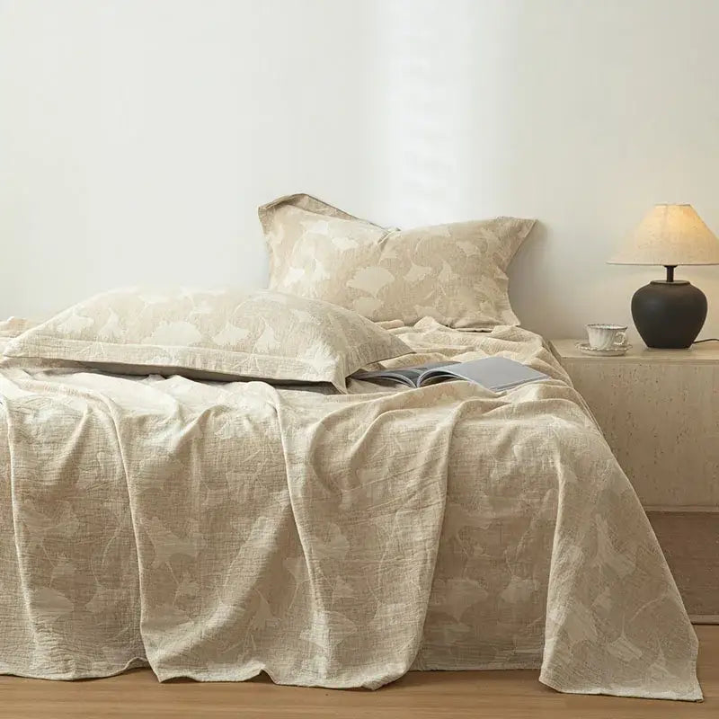 Beige fern leaf cotton linen bed sheet set featuring a subtle leaf pattern for bedroom bedding use
