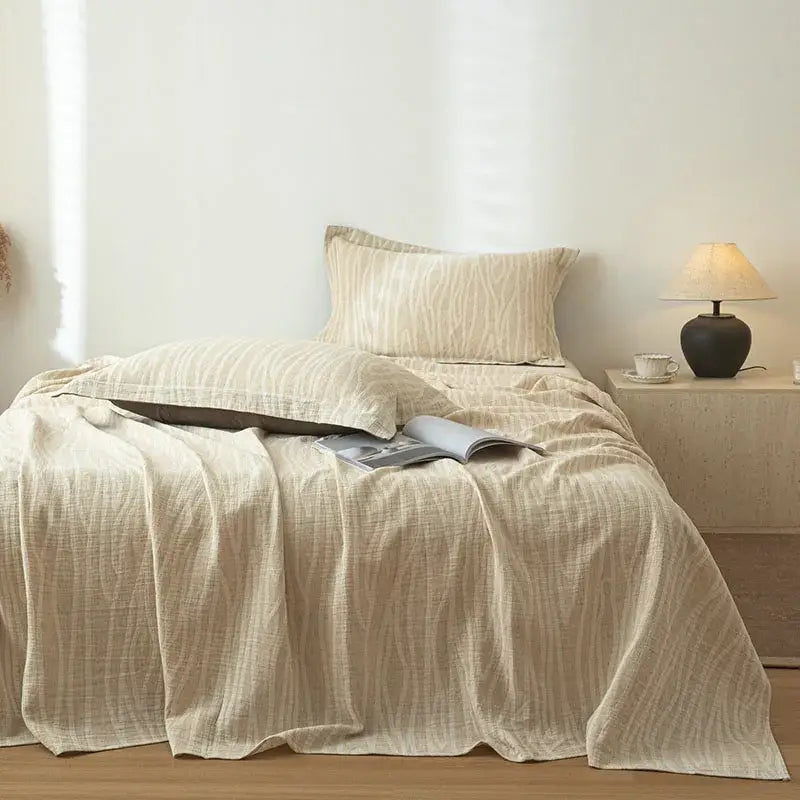 Beige fern leaf cotton linen bed sheet set featuring a textured fabric with a subtle wavy pattern for bedroom bedding