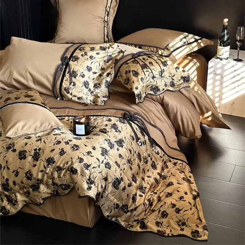 Elegant gold satin cotton patchwork bedding set with black floral embroidery and matching pillowcases for decorbites