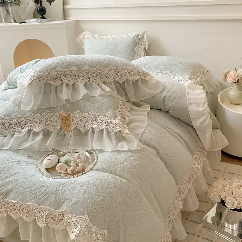 Light blue lace-trimmed ruffled bedding set with white floral embroidery for decorbites french lace ruffles bedroom decor