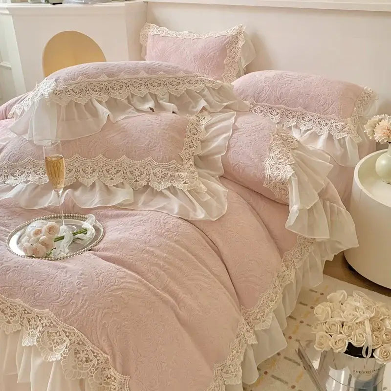 Pink lace-trimmed bedding set with white ruffled fabric accents featuring french lace ruffles for decorbites french lace decor