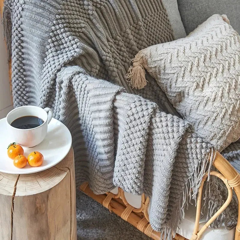 Gray textured knit throw blanket with chunky ribbed pattern and tassels by decorbites 3d knitted knitted tassel blanket