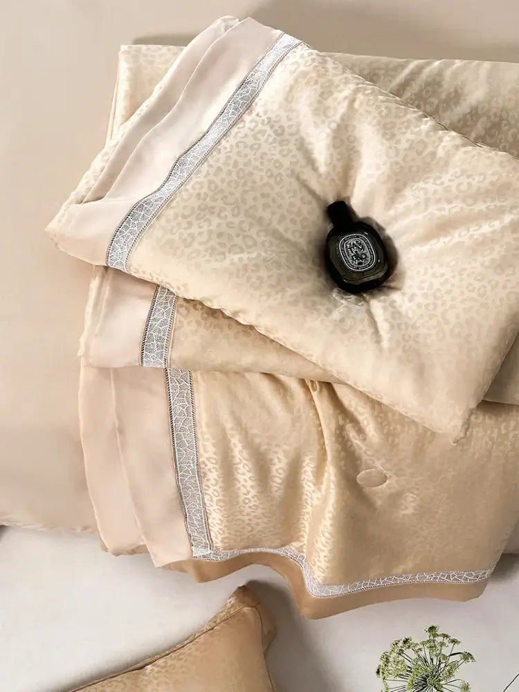 Beige satin pillowcase with subtle leopard jacquard print and silver geometric trim from decorbites leopard jacquard summer bedding set