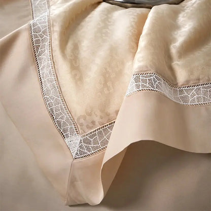 Cream-colored satin bedding set with delicate white lace trim and subtle leopard jacquard summer pattern by decorbites