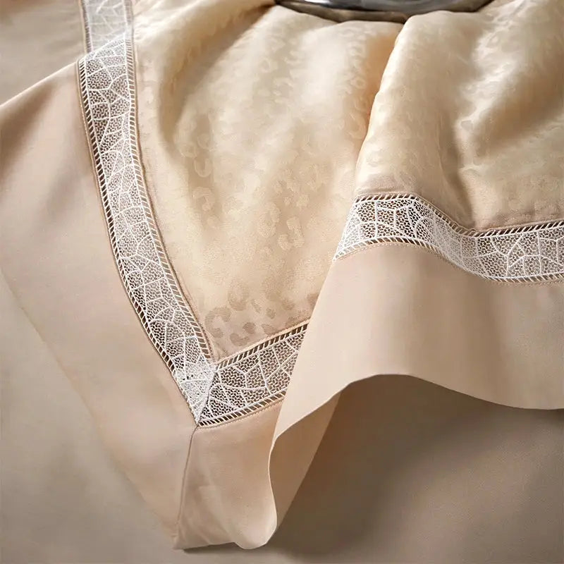 Cream-colored satin bedding set with delicate white lace trim and subtle leopard jacquard summer pattern by decorbites