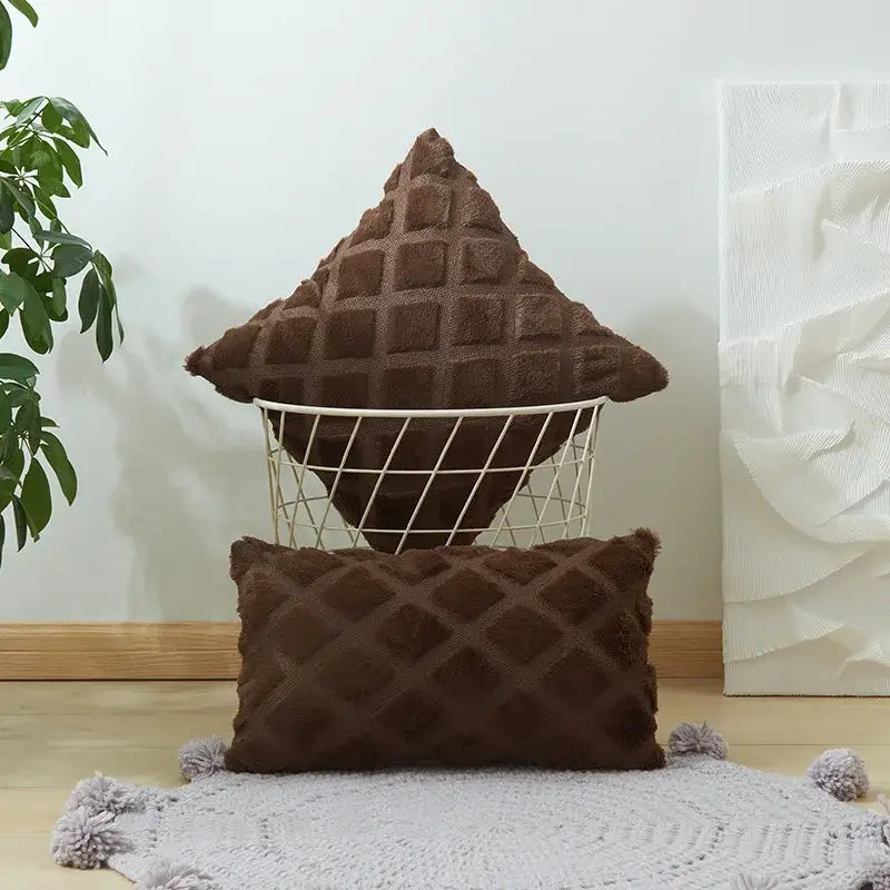 Brown textured throw pillows with geometric diamond pattern and fuzzy finish complement beige and gray cushion cover