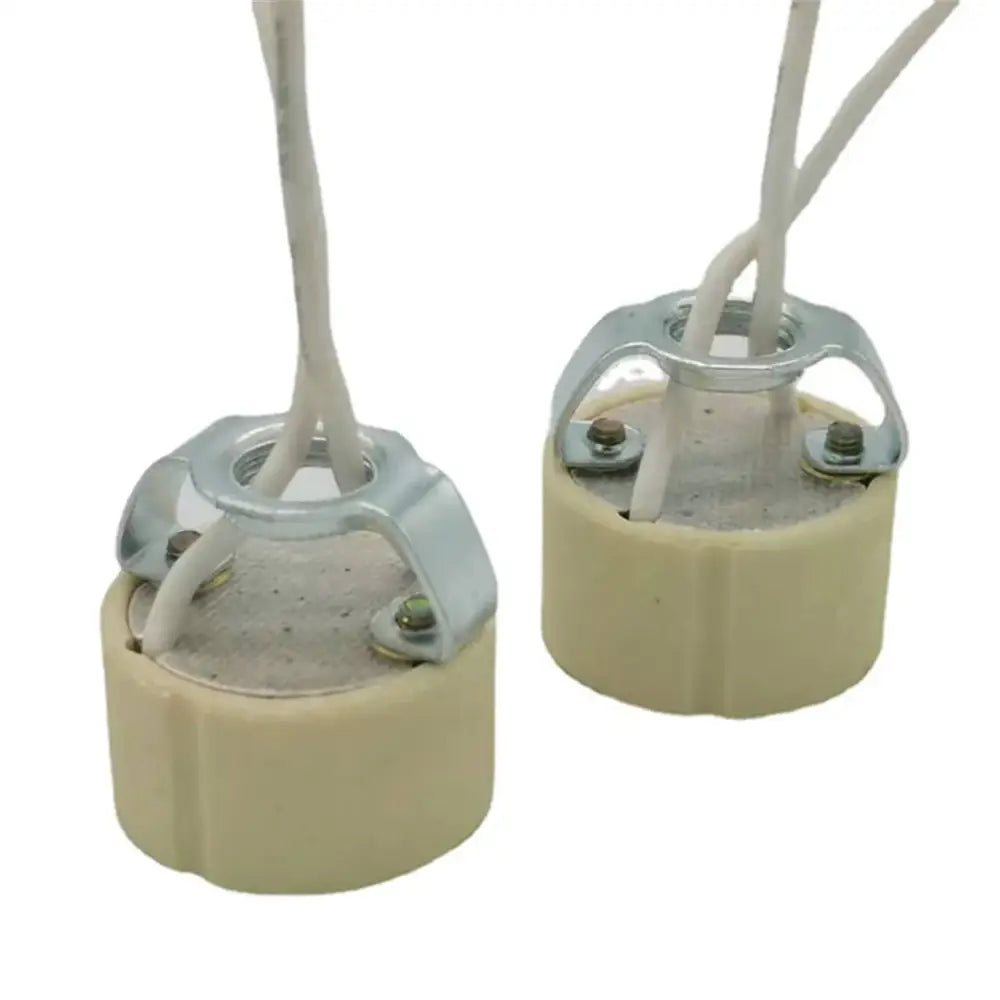 Beige gu10 ceramic socket holder with metallic bracket and white insulated wires for kitchen lights installation