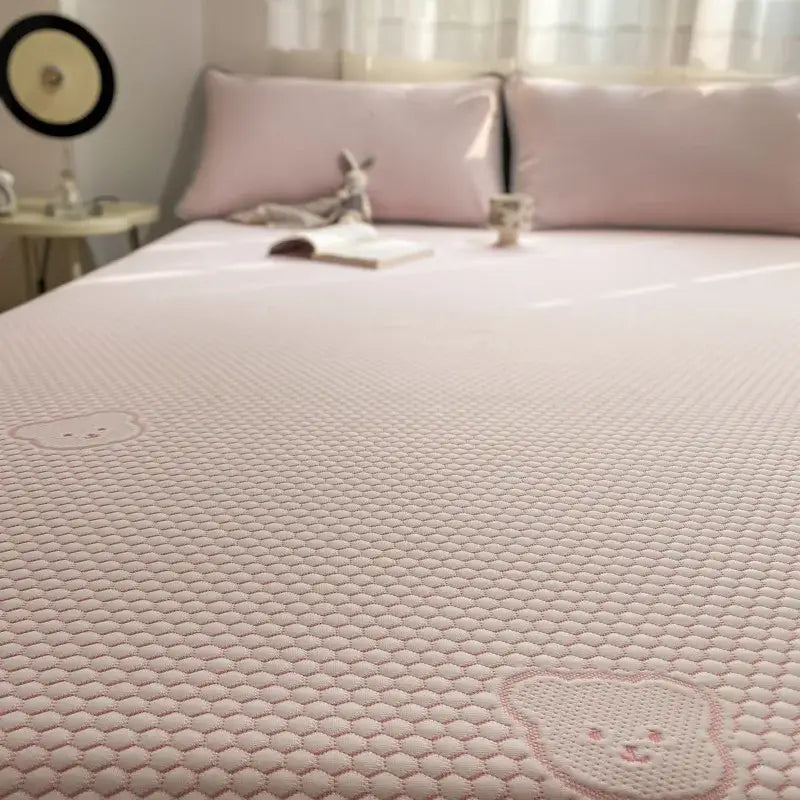 Pink honeycomb-patterned cooling mattress pad with embroidered bear faces from beige honeycomb bear decorbites cooling ice sheet set