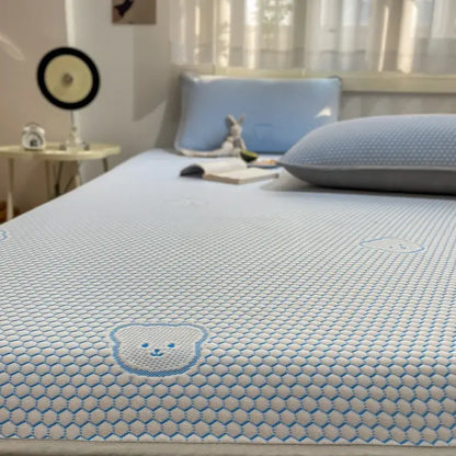 Light blue mesh cooling mattress pad with embroidered bear face design in beige honeycomb bear decorbites cooling ice sheet set