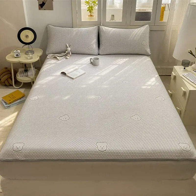 White textured sheet set with subtle gray bear face patterns in beige honeycomb decorbites cooling ice ice bean design