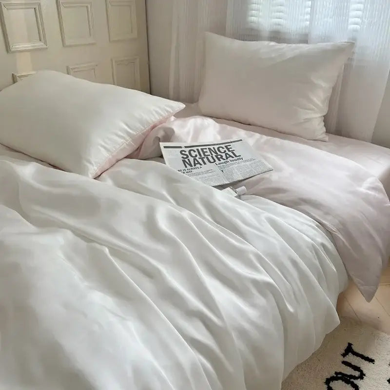 White satin duvet cover and matching pillows with subtle sheen in beige and light blue decorbites ice silky solid bedding set