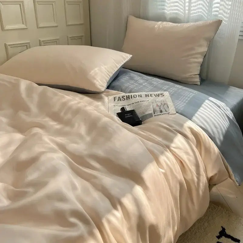 Cream-colored satin duvet cover with smooth glossy finish from beige and light blue decorbites ice silky solid bedding set