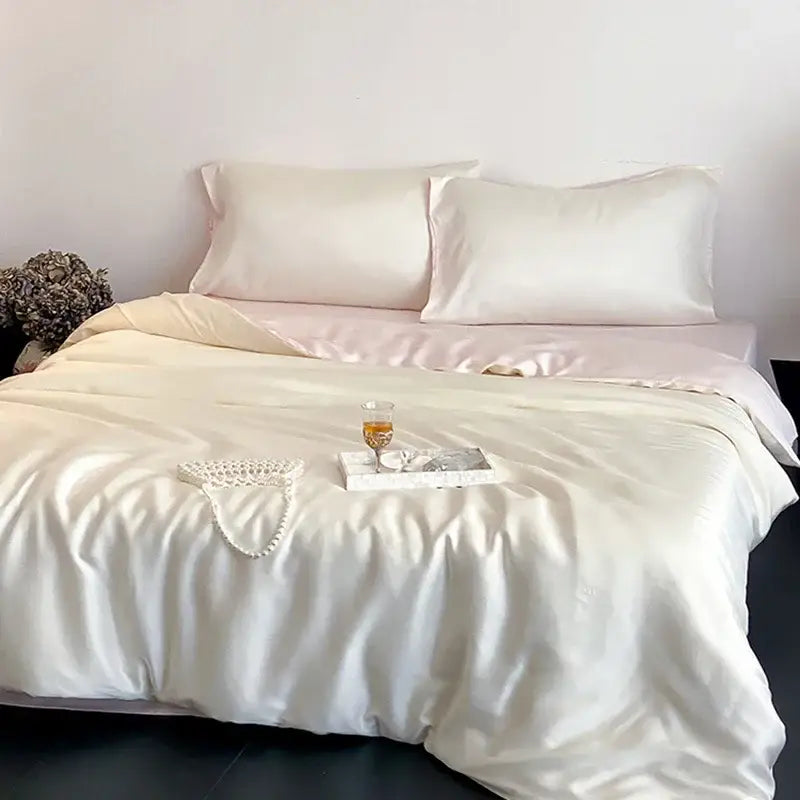 Cream-colored satin bedding set with decorbites ice silky solid finish featuring smooth glossy sheen