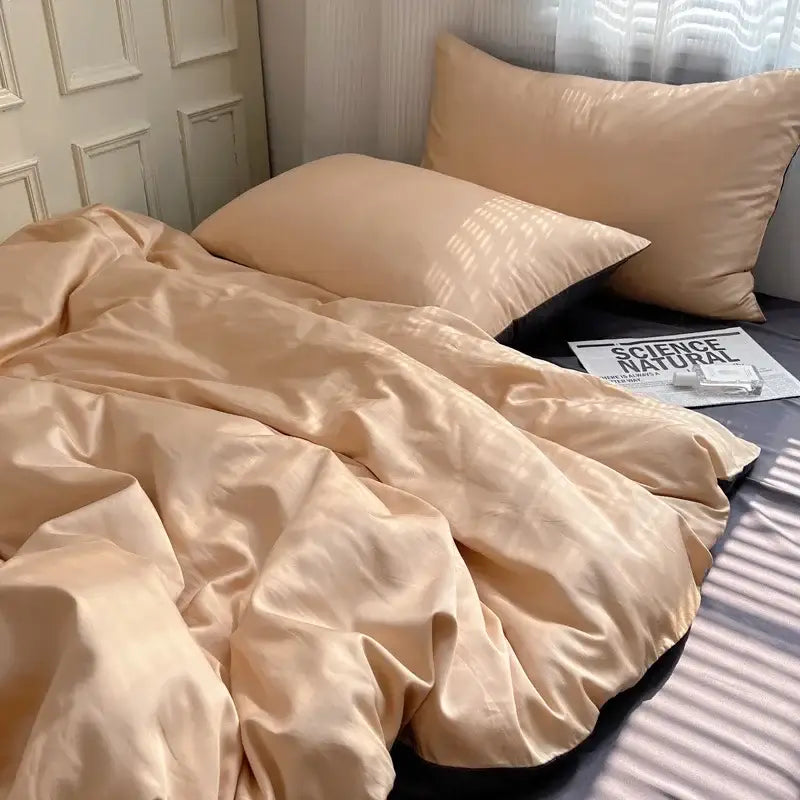 Beige satin duvet cover set with matching pillowcases featuring a smooth glossy finish in decorbites ice silky solid bedding set