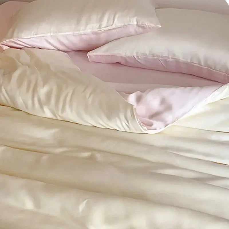 Soft cream satin duvet cover and pink pillows in beige and light blue ice silky solid bedding set by decorbites ice silky