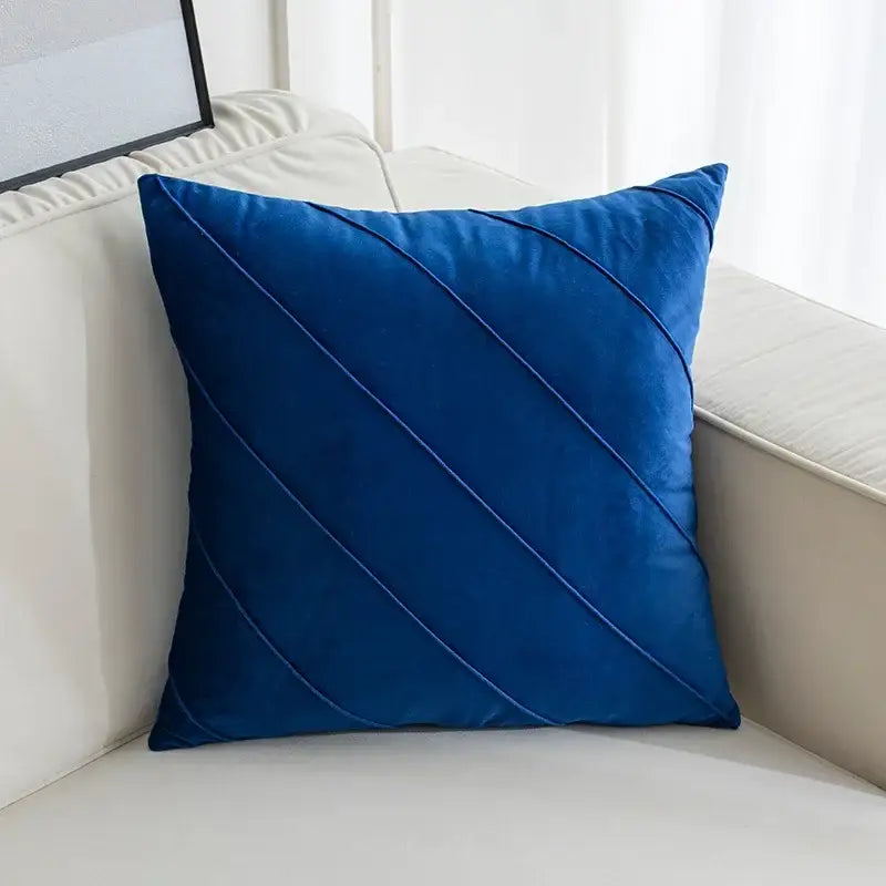 A rich royal blue velvet throw pillow with diagonal stitched accents for living room hand pleat embroidered cushions